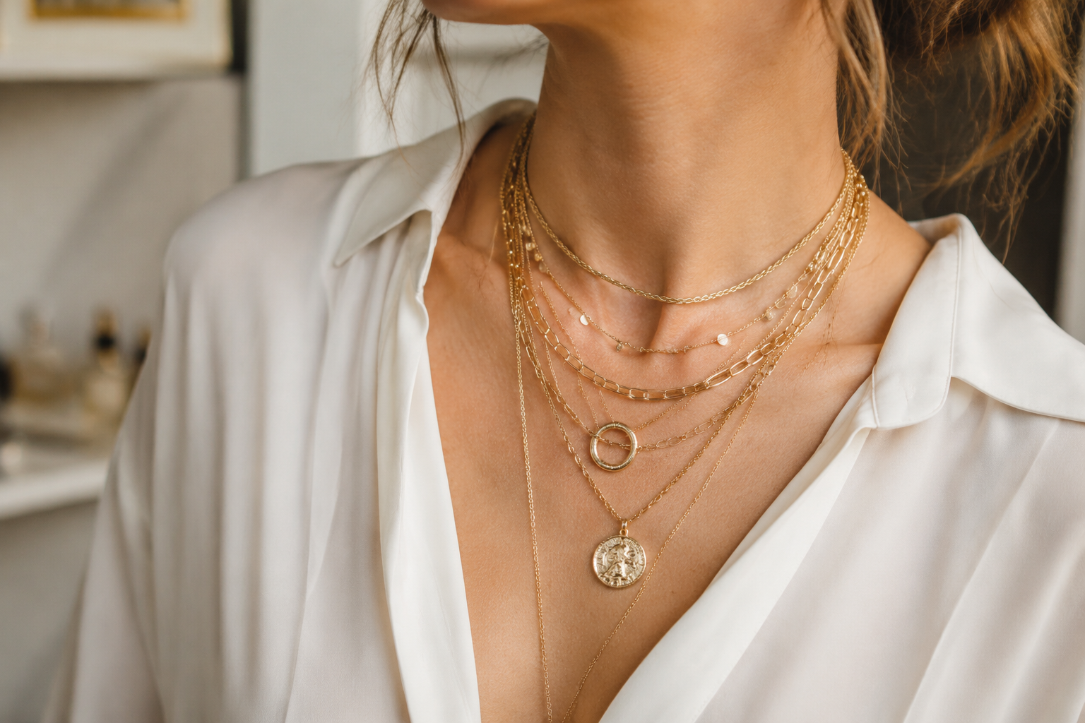 5 Jewelry Mistakes That Fight a Clean Neckline